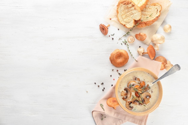 Homemade soup in a bowl on wooden table